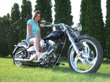 Dave's with Courtney...she's cute, but this bike pissed me off.  Looks good though, I think.  Maybe she helps.  She's only 15 in this pic you prevs...I own guns!!!!