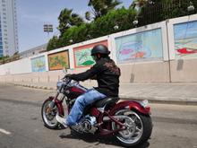 My mate on his nightster taking a pic of me while we cruise on the corniche (high shutter speed)