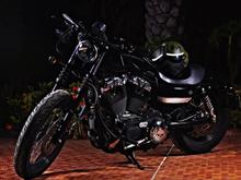 Nightster '09 with some mods:

Drag Bar
Nostalgic grips
Smoked and relocated turn signals
Forward Controls
Willie G Gas Cover
Willie G Derby Cover
Willie G Forward control linkage
Blacked out Primary cover
SE Stage II air intake

I think thats about it..... definitely more to come