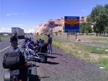 bikes in front of arizona sign