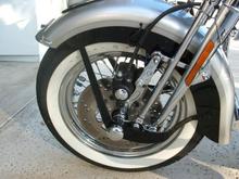 HD chrome 100 year anniversary front brake caliper cover.