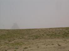 Shiprock N.M. Barley visible thru strorm