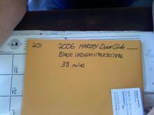 Paperwork packet from the place I bought the bike. Note the mileage on the envelope.