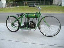 Good friend of mine in Oklahoma built this one himself. Chopped up an old bicycle frame, welded this and that, and used an engine from an old Maytag washing machine.