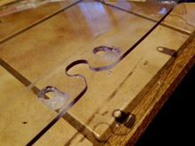 Provide clearance for wires to get below the seal area without pinching.  Used a dremel to rout about half way through.  I thought about just having slots, but then it would be trying to align the windshield with seven things, not just the three posts, and that would weaken it substantially  Had to remember to do it on the front