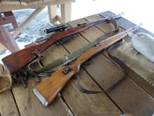 Mosin Nagant 91/30 with PU Scope on top.  Yugoslavian M48/a on the bottom