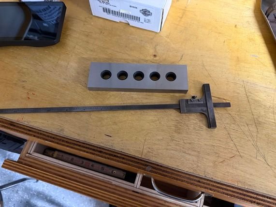 Depth vernier and parallel bar.