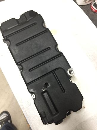 Mystery solved. Looks like he somehow tripped up a rod/bolt that had the perfect length to wedge between the road and the pan. Once in a million. 