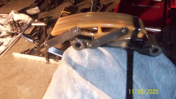I used a large zip tie to hold the compression on the automatic chain tensioner. 