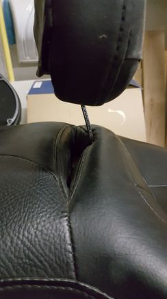 This is with the backrest in the slot.  It fits like my stock seat did