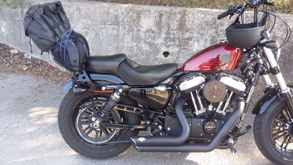 I bought a Vintage Wide Touring seat and my wife loves me. Lol... I have to say, for trips, it was worth the sacrifice of looks. It feels great. I sit a little higher in the saddle than i like but.... Great seat Mustang!!
