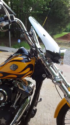 I put on some detachable fork clamps on my Memphis Shades windshield. Now when i take the shield off there is nothing on the bike.
I only use it  for day long trips and rain. Lol
I'm not crazy about windshields. ..