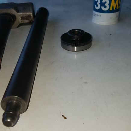 Here is the Jims tool and to the right is how the dies and wedge should be lined up inside the old race or the new race durning removal and install. I highly remomend using this tool. It makes removal 100x easier. 
I also saw a video on youtube where a guy was using what i think was a plasma cutter to cut his old races out. So apperantly you can do that also.