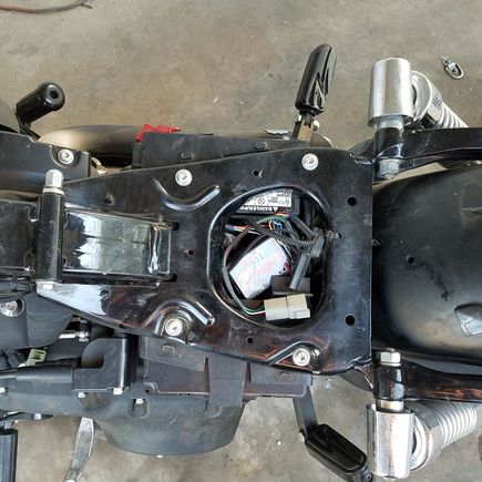 TT mounted under seat