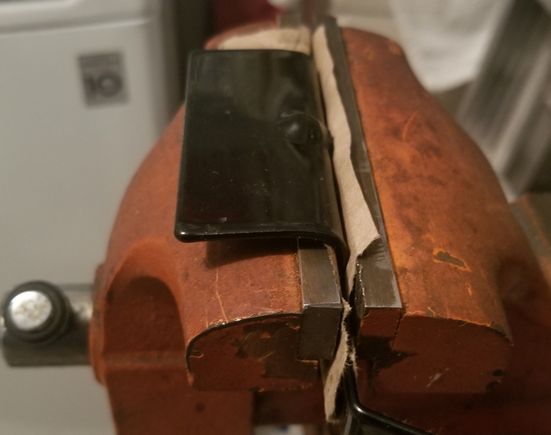 Ued hammer and block of wood to bend bracket.