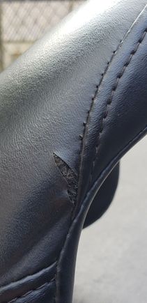 SMALL RIP IN SIDE  