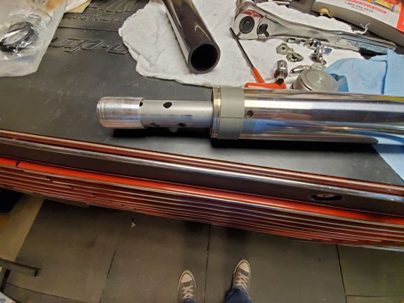 Damper rod installed in fork tube.  Not much protrudes, only about half.