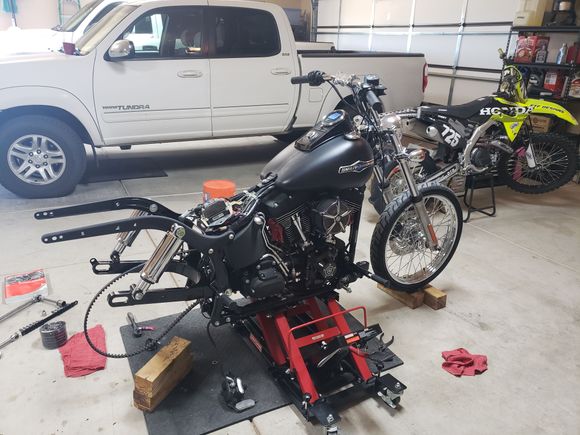 Finally put on the rear shocks.  The air compressor was a little of a pain in the ass to get hooked up but its finally in there.  As soon as my rear wheel gets here I'll start mocking up my fender and get working on the exhaust. 