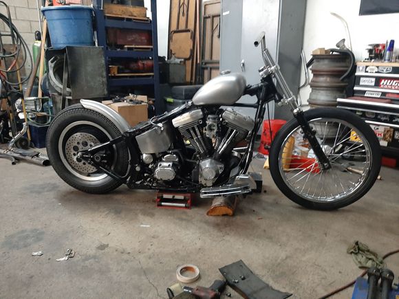 Changing floorboards to half moons and chopping up the stock exhaust untill i can decide what style pipes i want 