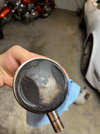 Piston one top side. You can see it marked.020.