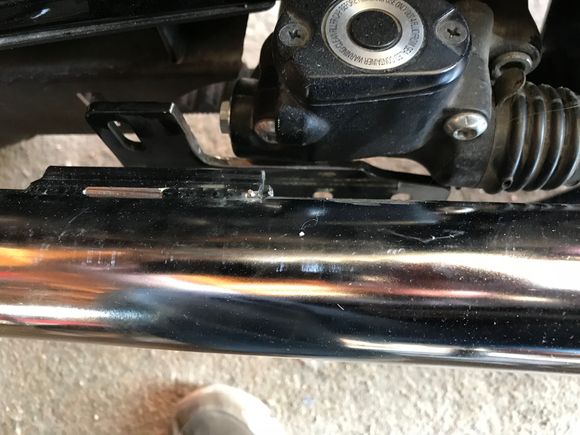 Here you can see the mock up. The bracket just clears the resivoir. I also had to cut part of the mount on the pipe itself. Very easy, BUB TIG welded the bracket on in three places so I just ground down the forward TIG welds and popped off the first two inches of the bracket. It’s no use anyway due to the mount being cut, there is no where to put a bolt through except the rear mount hole. All this is for the top pipe (rear cylinder)