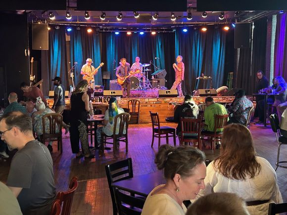 Name of the band is Bunco. The were very good.  Music from several decades adopted to their style.  They play around the BRP part of Va. 