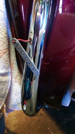 The LED assembly, mounting and wiring holes.