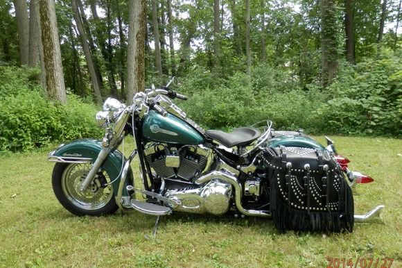 Tank lift , coil relocation, wolo horn install and ironmax bags