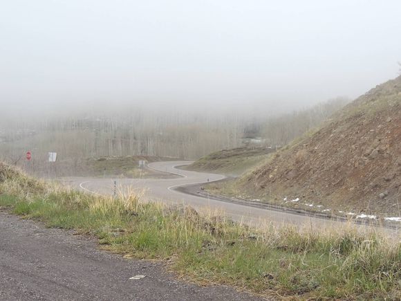 You can see a little bit of snow on the roadside, but check out that road down!