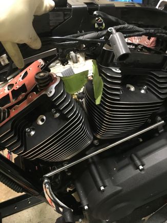 Install your rocker box gaskets and make sure the oil breather passage is covered as shown in the SM.