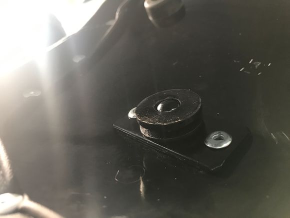 Shows how pin is not long enough to pass through grommet