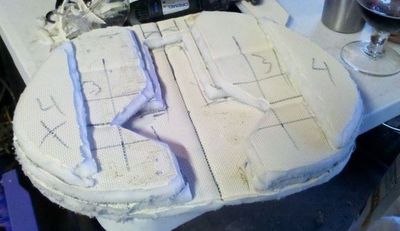 I rounded all the edges over with an angle grinder (gently!!!) to smooth it out before stuffing it in the shell.