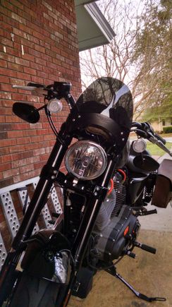 I like this because I get no buffeting but it takes hit off of my chest. When I ride my wife's my head Bob's around.