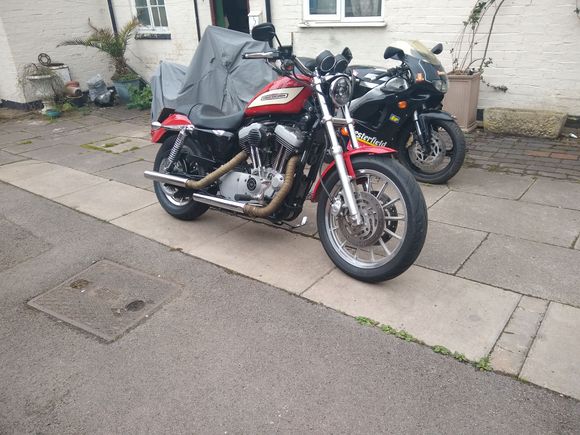 Just got home , ignore the bikes in the background , they are just money making projects to support the Harley.