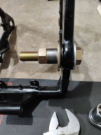 Home made 3/4"bolt puller/ installer.. Don't worry I had a special washer in there that I used to make sure I only made contact with the race of the bearing and not the spherical bearing, a little grease helps here..