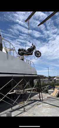 I’m a boat captain and I bring boats inter-island a few times a year. Sometimes I bring my bike w me. Either use the fish crane on the loading dock, or the fork truck if we’re on the hard.