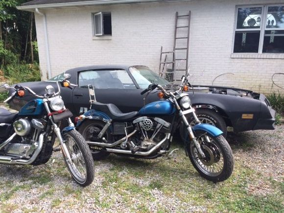 Another picture of my bike and trans am along with my dads super glide.