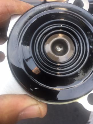 Inside of old unit. Looks to be a slight indent started from pushrod. Think I will replace with newer version.
