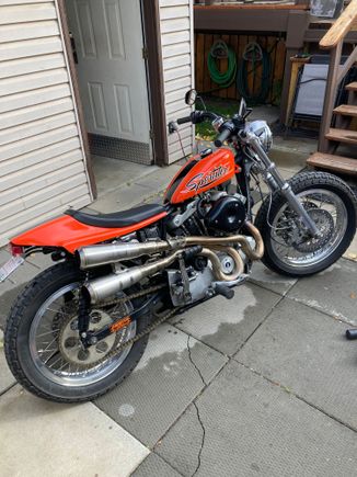 I found that Harley still had the rh lower fork leg available so I added my second brake in August . 