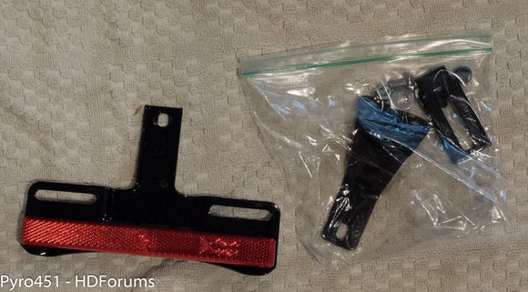 OEM black stand up plate frame and hardware.