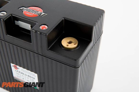 Notice, the battery's charging posts are not installed out of the box, this allows the user to configure the battery's wires as needed for a clean installation.