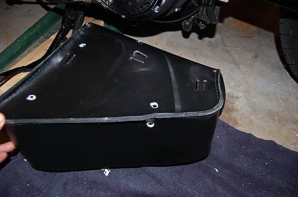 This is where I chose to drill my own attachment holes, using 1/8" leather lacing (doubled up).