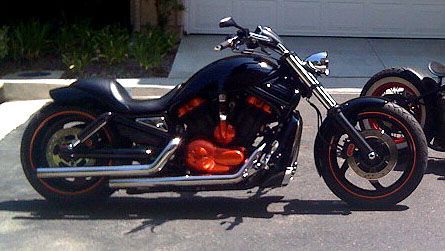 2005 V-Rod Painted Engine Covers, 240 rear wheel, air ride, custom fenders, bars, seat, wheels, and Tank cover!
