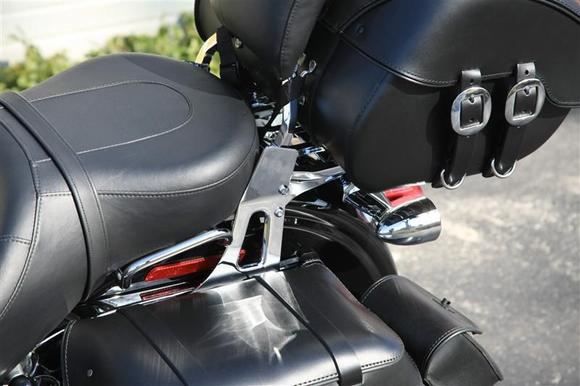 Luggage rack lowered 3-7/8". Added bolts heads give this mod away