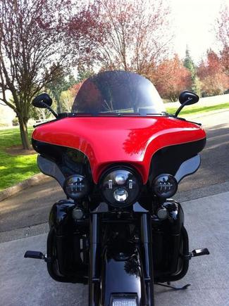 Front view.  Camera lens is exactly level with top of fairing, so you can see that the bars are just barely visible.  Amazingly, my hands were out of the wind at all speeds.