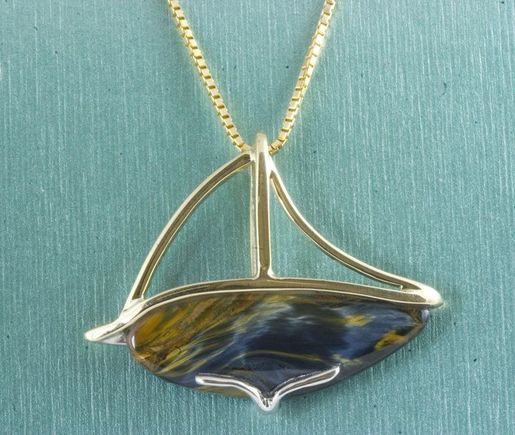 Pietersite set in yellow and white gold