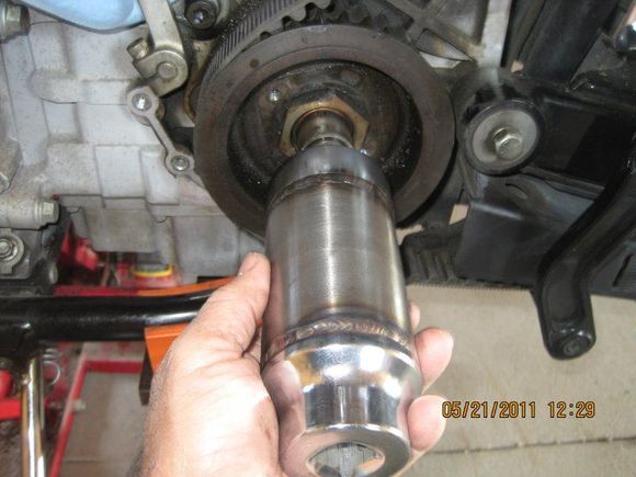 Modified 1 7/8" socket to remove nut from transmission drive pulley.