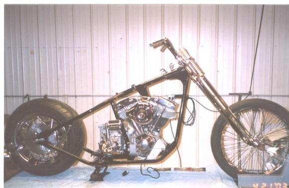 Redoing the Shovel. This time, it's a slightly raked and stretched Paughco frame (wide tire) and Paughco springer (6" over).