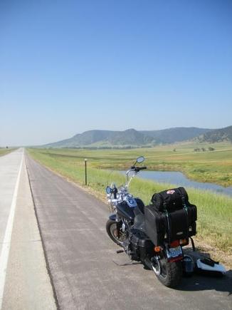 My favorite pic of the bike (so far).  Clear skies and a nice stretch of asphalt.  What more does a rider need?
