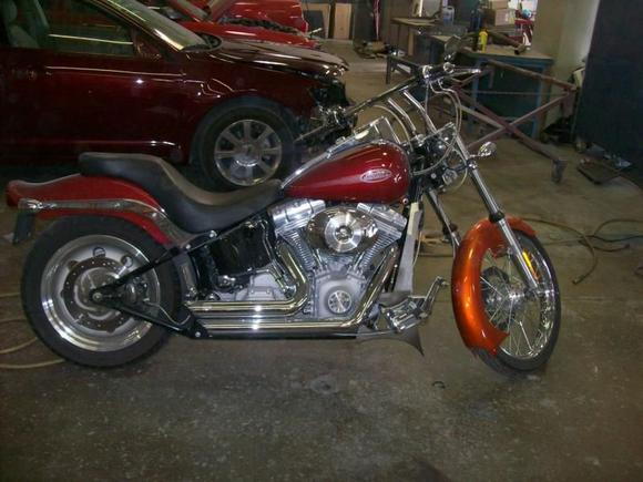 Custom front fender installed and painted Kandy Tangerine.